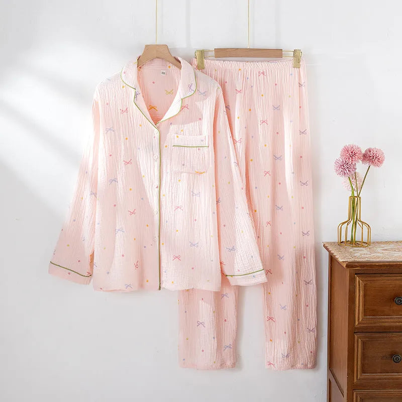 Women's cotton pajama set in pink or beige with long sleeves and matching trousers