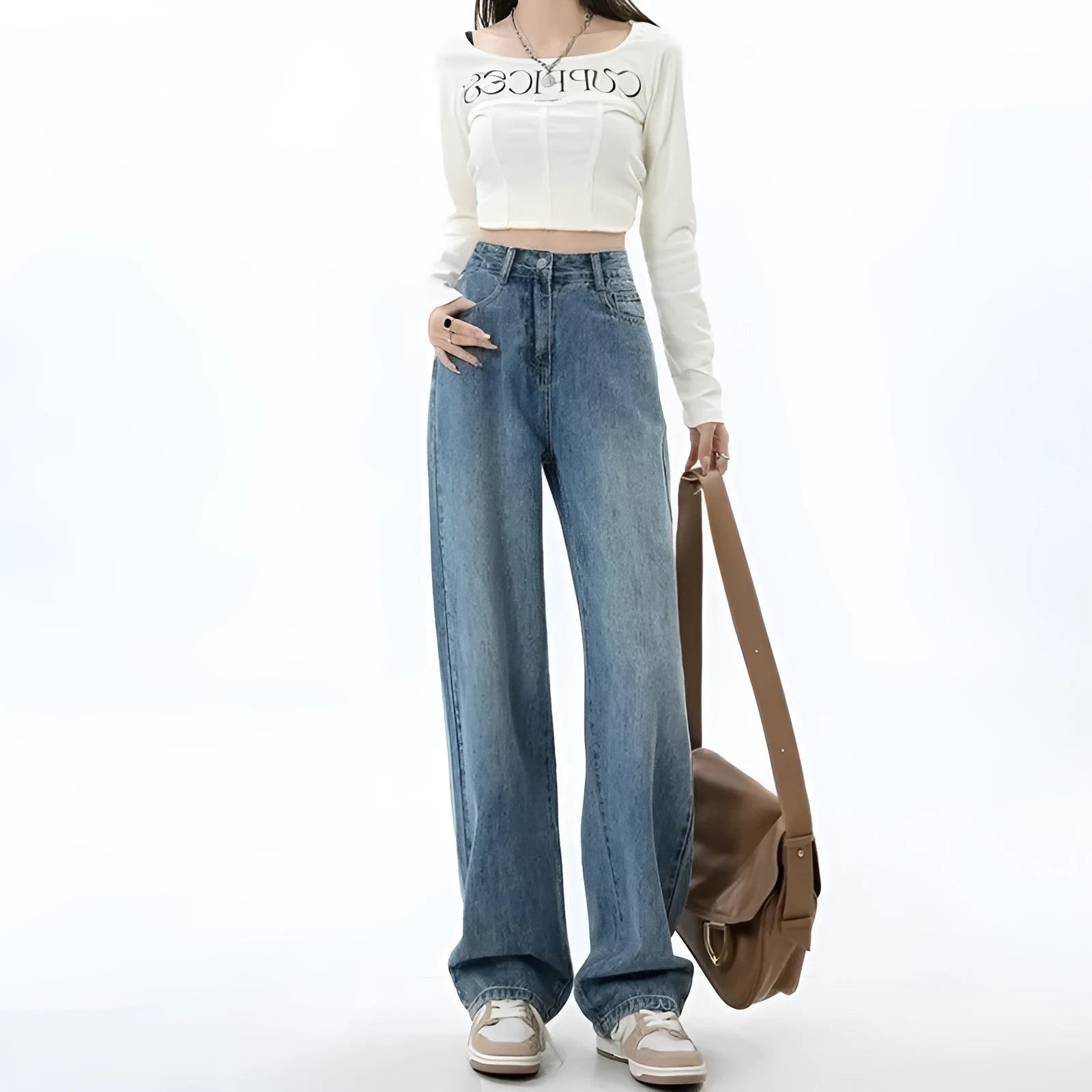 Retro blue high-waist wide leg jeans on a hanger showing straight leg trouser cut.