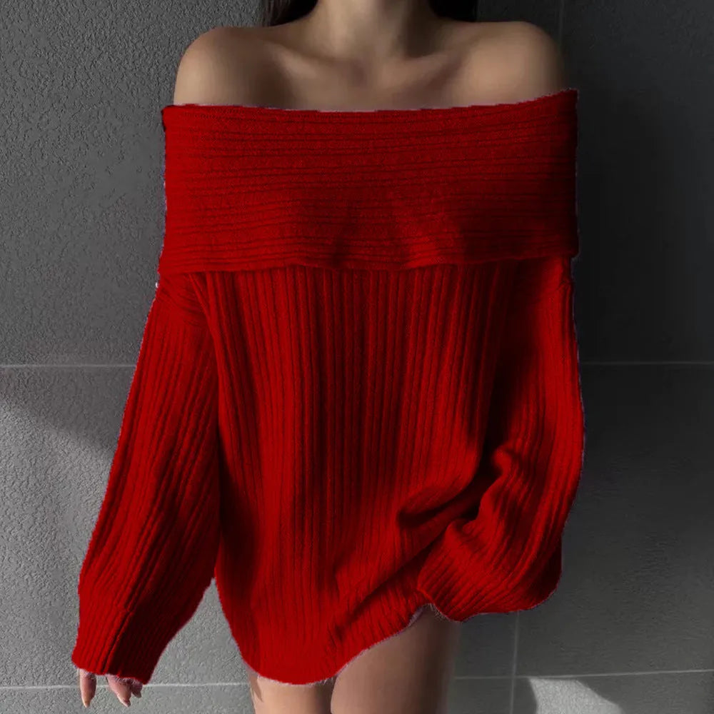 A woman's loose-fitting, long-sleeved pullover sweater in acrylic fibre, shown on a hanger.