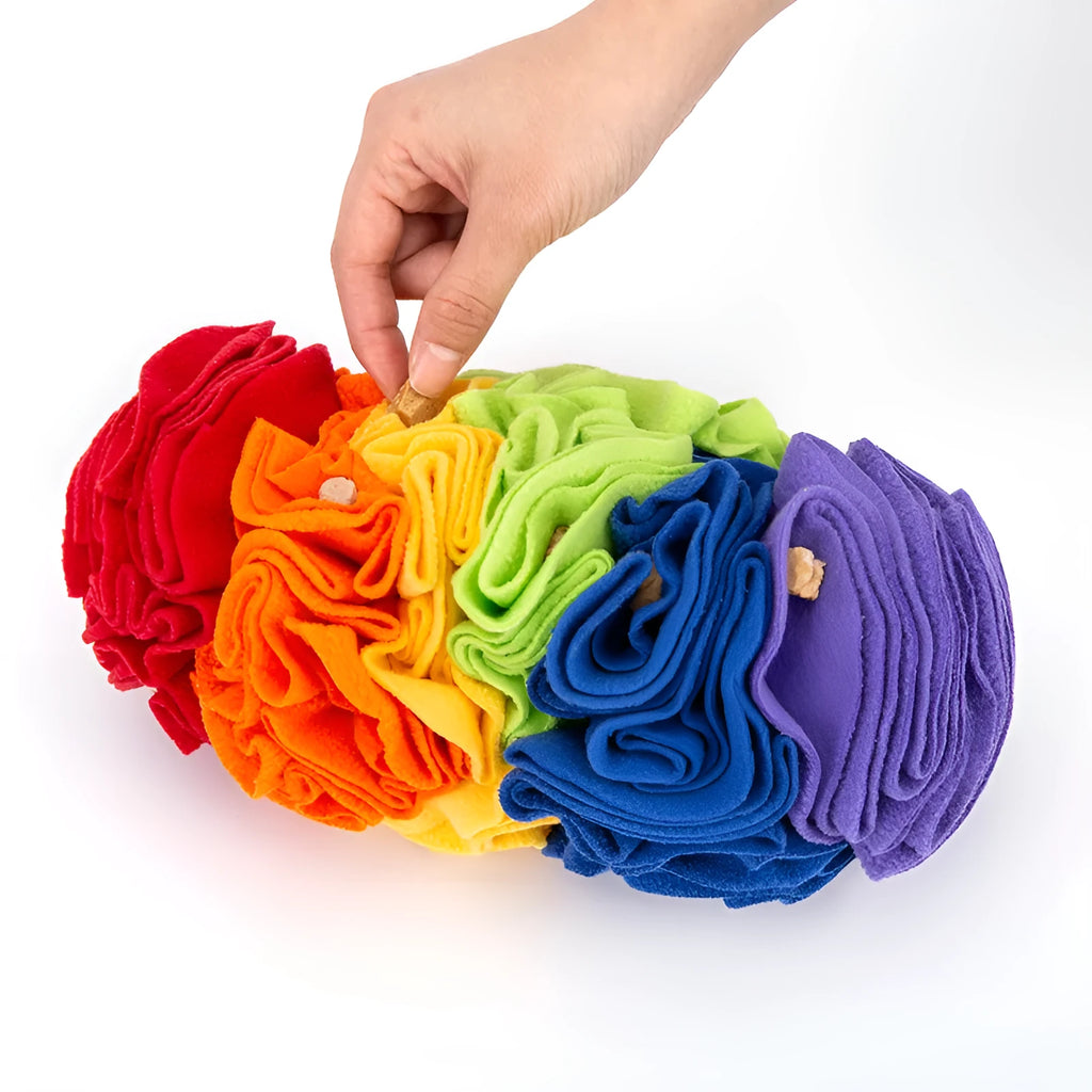 Dog snuffle pad made from polar fleece in rainbow colour, size 25x15cm, with treats hidden in fleece strips