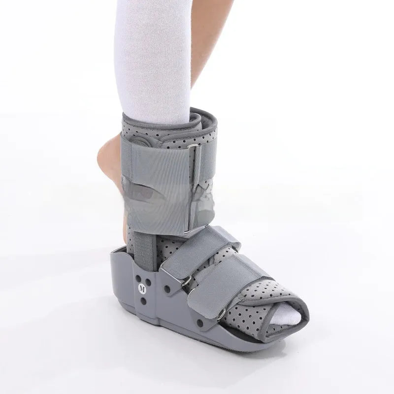 Grey and black Achilles tendon rehabilitation walking boot with adjustable straps
