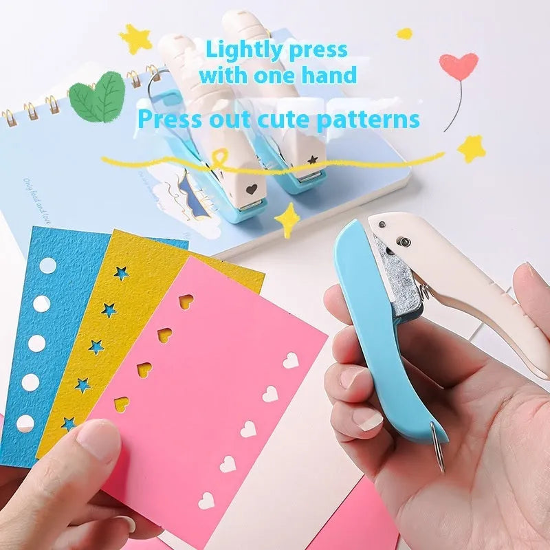 Small manual handheld punching machine with embossed love, star, and round shape cutters for paper crafts.