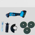 Mini cordless angle grinder with rechargeable 26V lithium battery and three saw blades on a work surface