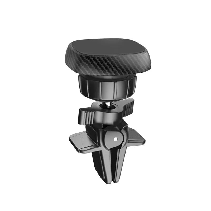 Black magnetic car phone holder attached to vehicle air conditioning vent