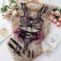 Light blue women's lace push-up bra and matching pants set on a hanger.