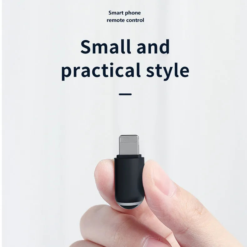 Black capsule-shaped infrared universal remote control emitter with Lightning, type-c, and micro-USB interfaces.