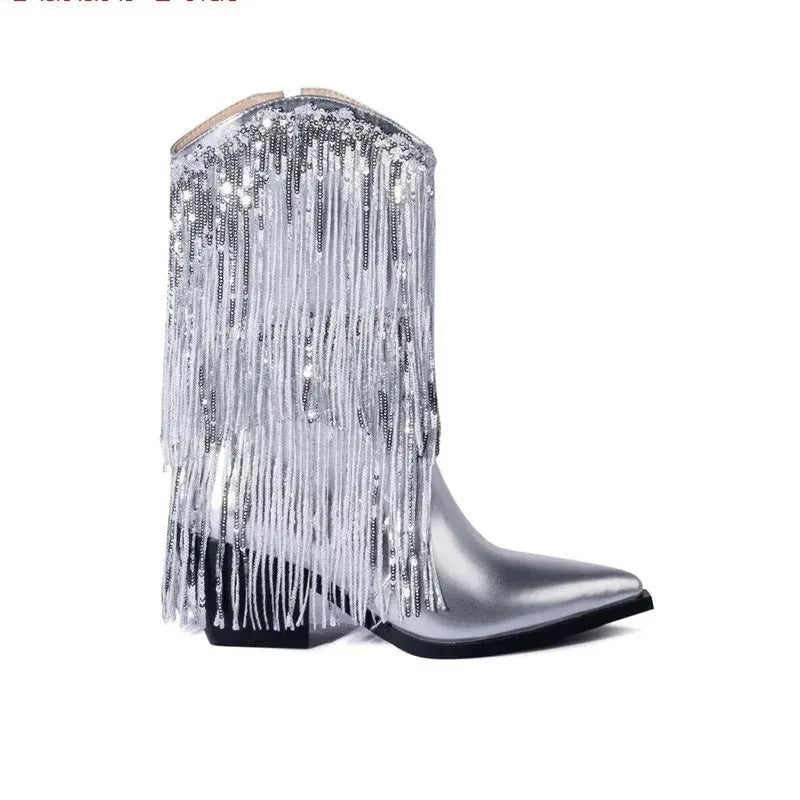 Women's black chunky heel ankle boots with tassel detail and a high stiletto heel on a plain background.