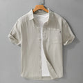 Men's light blue short-sleeved cotton shirt with loose fit and cardigan style for summer wear