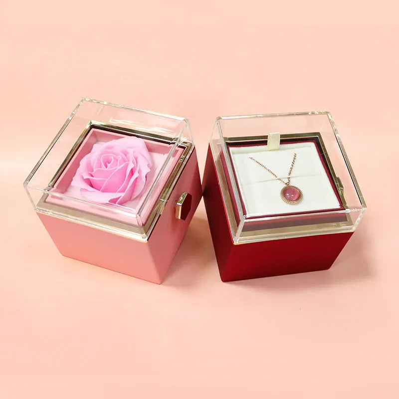 Rotating rose jewellery gift box with acrylic transparent cover showing preserved rose and rotating drawer open.