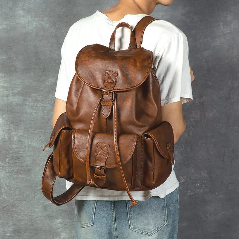 Genuine leather retro backpack with ergonomic back panel and geometric pattern in light brown and black 15 inch