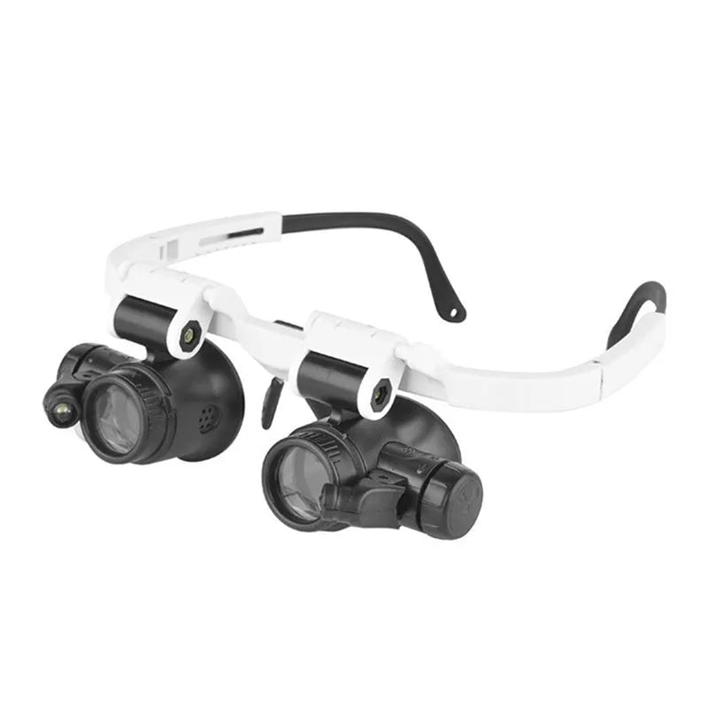 White foldable head-mounted magnifying glass with LED light for 30X precision repair work.