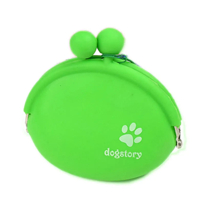 Silicone dog training treat pouch with waist clip in assorted colours on a belt.