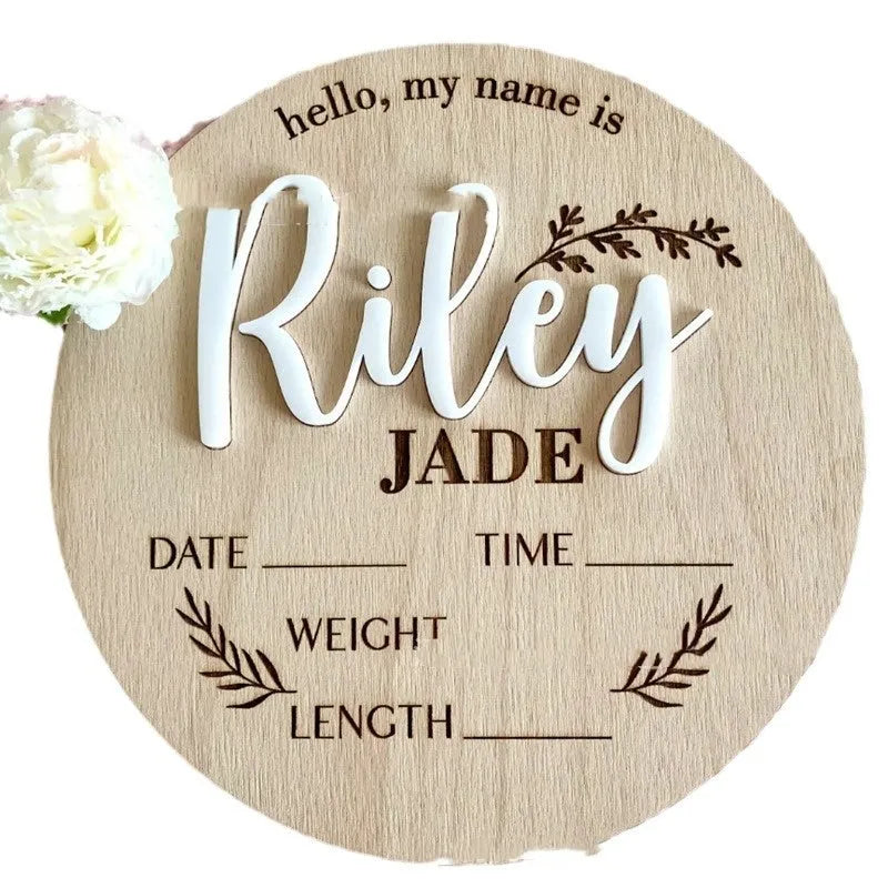 Square wooden baby name label displaying birth information with 15cm dimensions
