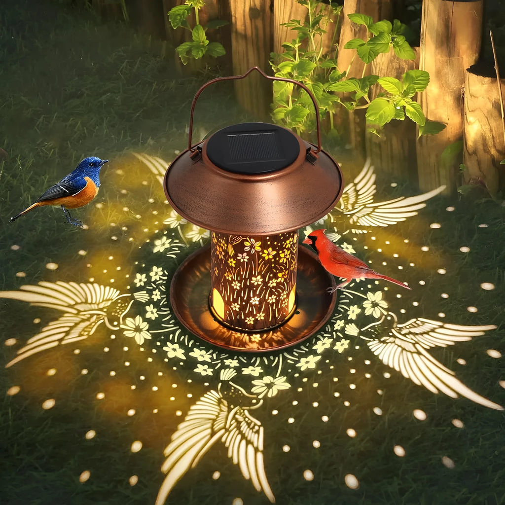 Iron art solar-powered bird feeder lamp with hummingbird pattern design for outdoor gardens.