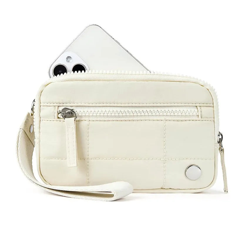 Waterproof quilted women's handbag with transparent deck section in solid colour
