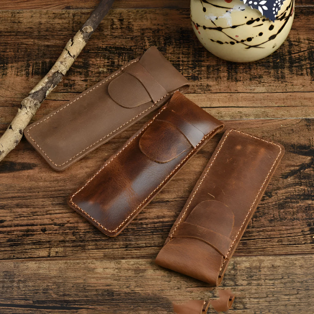 Vintage leather pencil case in square design showing black and brown colour options