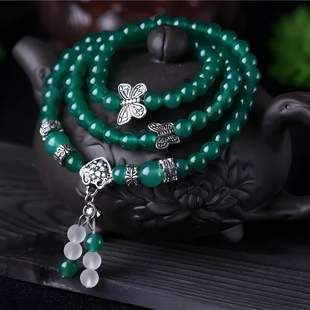 Green agate multi-layer bracelet with 6mm beads and three-circle chain design.