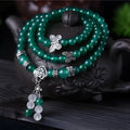 Green agate multi-layer bracelet with 6mm beads and three-circle chain design.