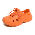 EVA thick bottom sandals in fluorescent green, orange red, and rose red colours showing unisex beach shoe design