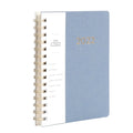 Green 2022 student weekly planner with coil binding, PU leather cover, open to show monthly grid and pockets.