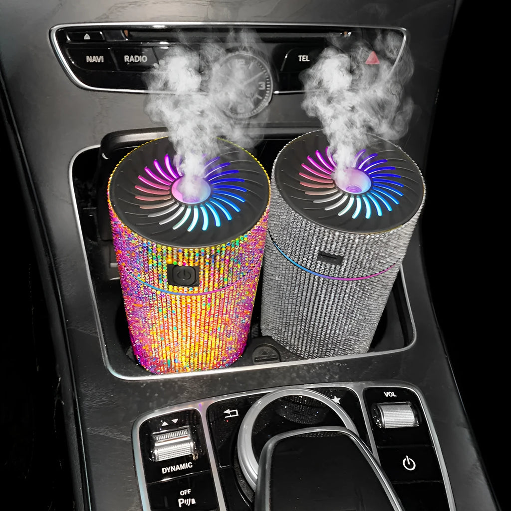 Car humidifier with diamond-shaped water reservoir in various colours, showing USB power connection