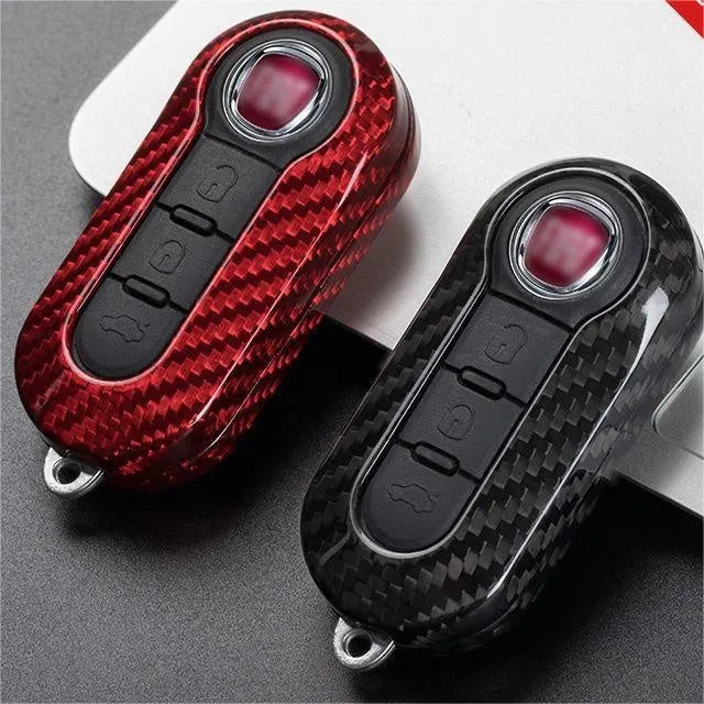 Carbon fibre and glass fibre replacement shell for a car key fob in Black, Red, and Silver Black colour options.