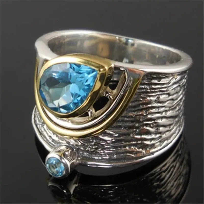 Women's blue zircon inlay ring in creative Chinese style drop shape design on alloy band