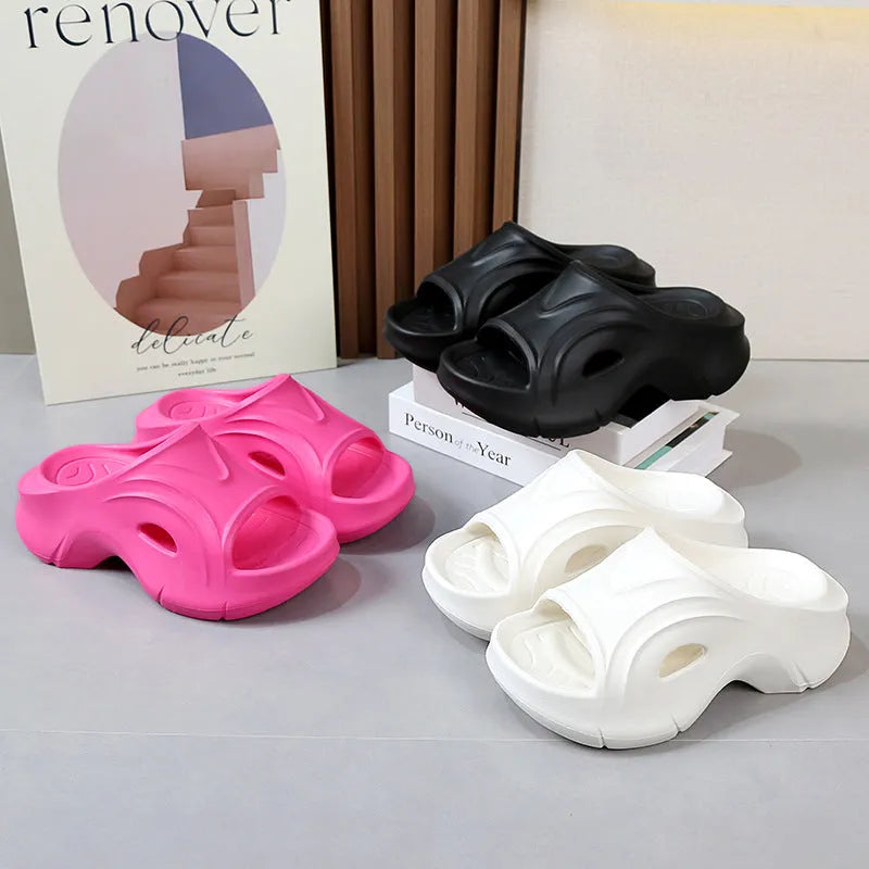 Women's thick-soled EVA beach slippers in rose red colour with round toe design.