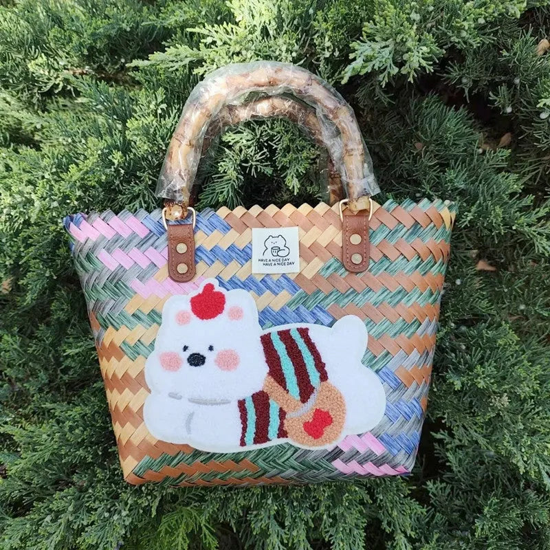 Bamboo handle woven basket handbag with dog design, large capacity PVC travel tote.
