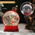 Set of four battery-powered LED Christmas decoration figures including old man, snowman, child tree and angel