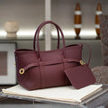 Women's genuine leather horizontal square crossbody handbag with single strap, zippered compartment, and inner patch pocket