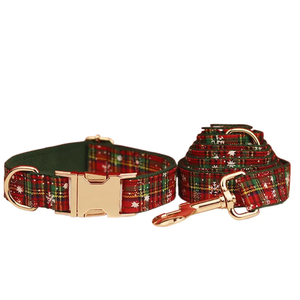 Green snowflake Christmas pet collar set with matching leash, bow, and vest for dogs