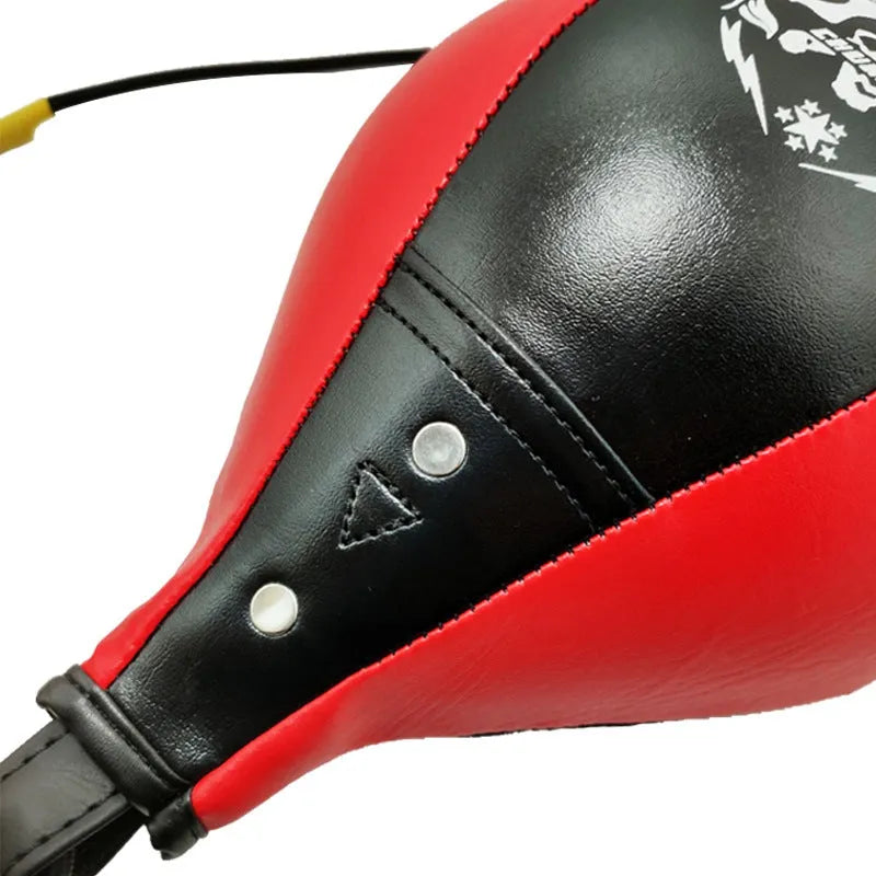 Black and red diamond pattern inflatable boxing speed ball for Muay Thai training.