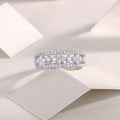 Moissanite wedding ring set on white background, S925 silver with platinum plating, ring size 7, includes GRA certificate and gift box