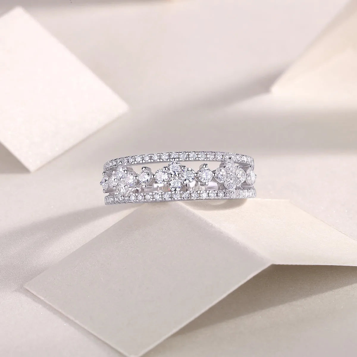 Moissanite wedding ring set on white background, S925 silver with platinum plating, ring size 7, includes GRA certificate and gift box