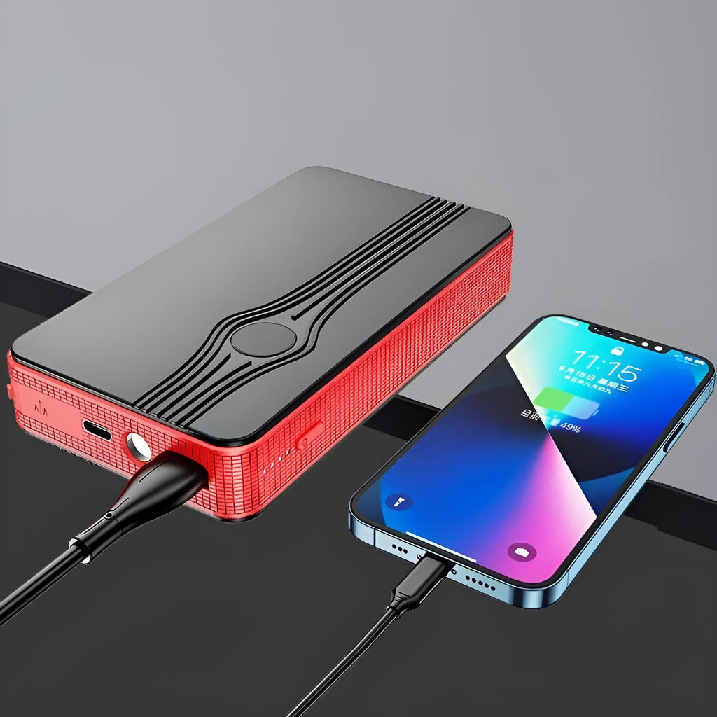 Red K4-E automobile emergency jump starter power supply with data cable.