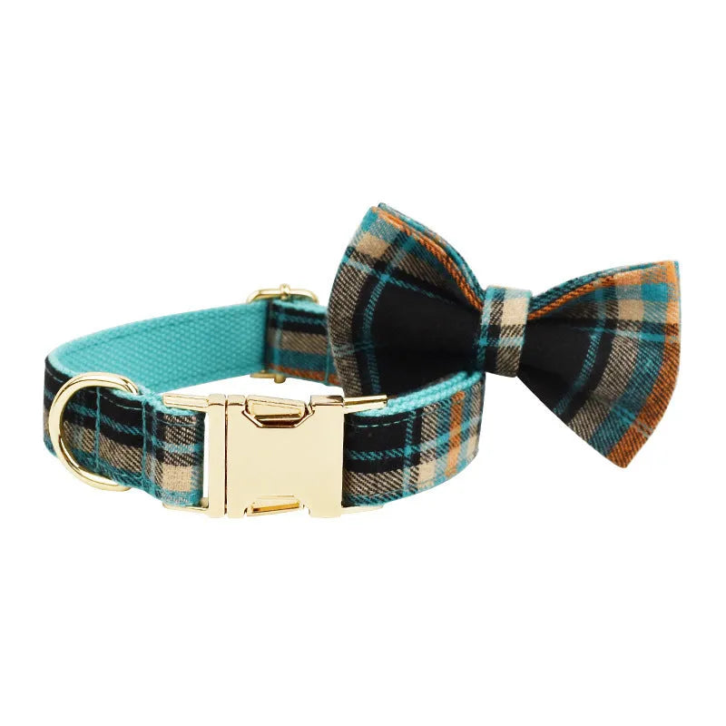 Retro green cloth dog collar leash set with matching vest and bow tie on white background