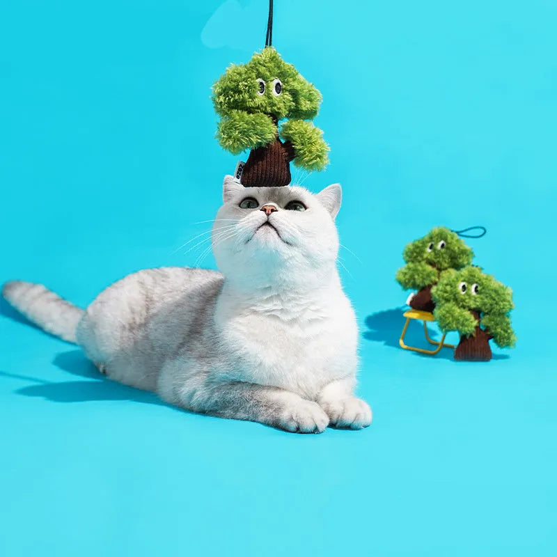 Cat toy with mint bag pendant attached to chewable teasing stick