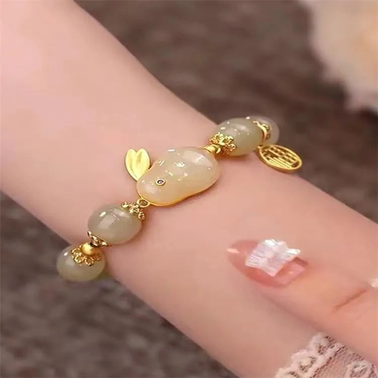 Green mixed-material jade hare bracelet with electroplated finish and lily decorative elements