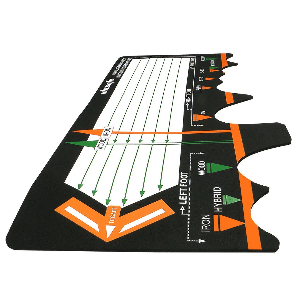 Black neoprene golf swing training pad with alignment markings on a green artificial turf surface.