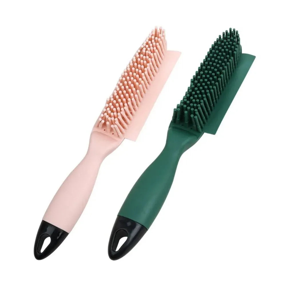 Green and pink dog brush with rubber bristles and pet hair remover function