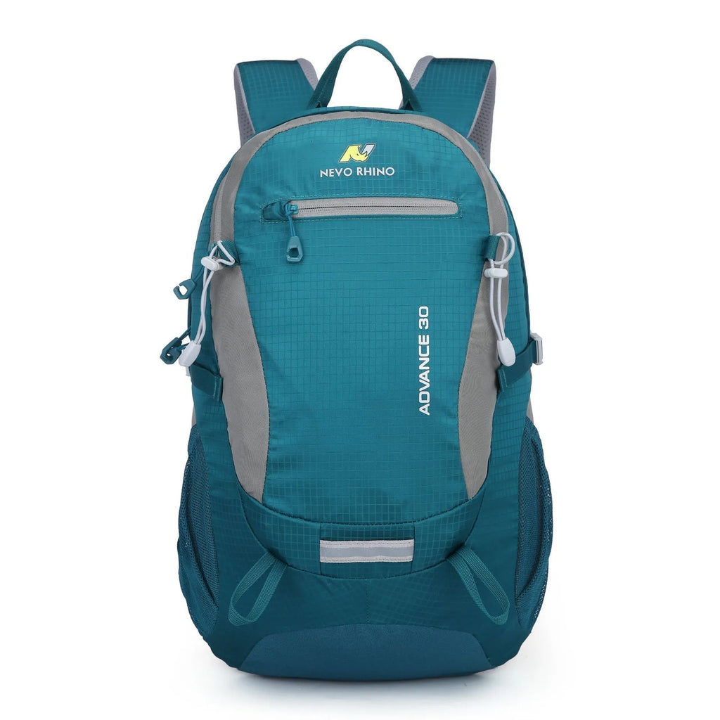 30-litre dark green waterproof mountaineering backpack with airpillow straps on a rocky outdoor trail