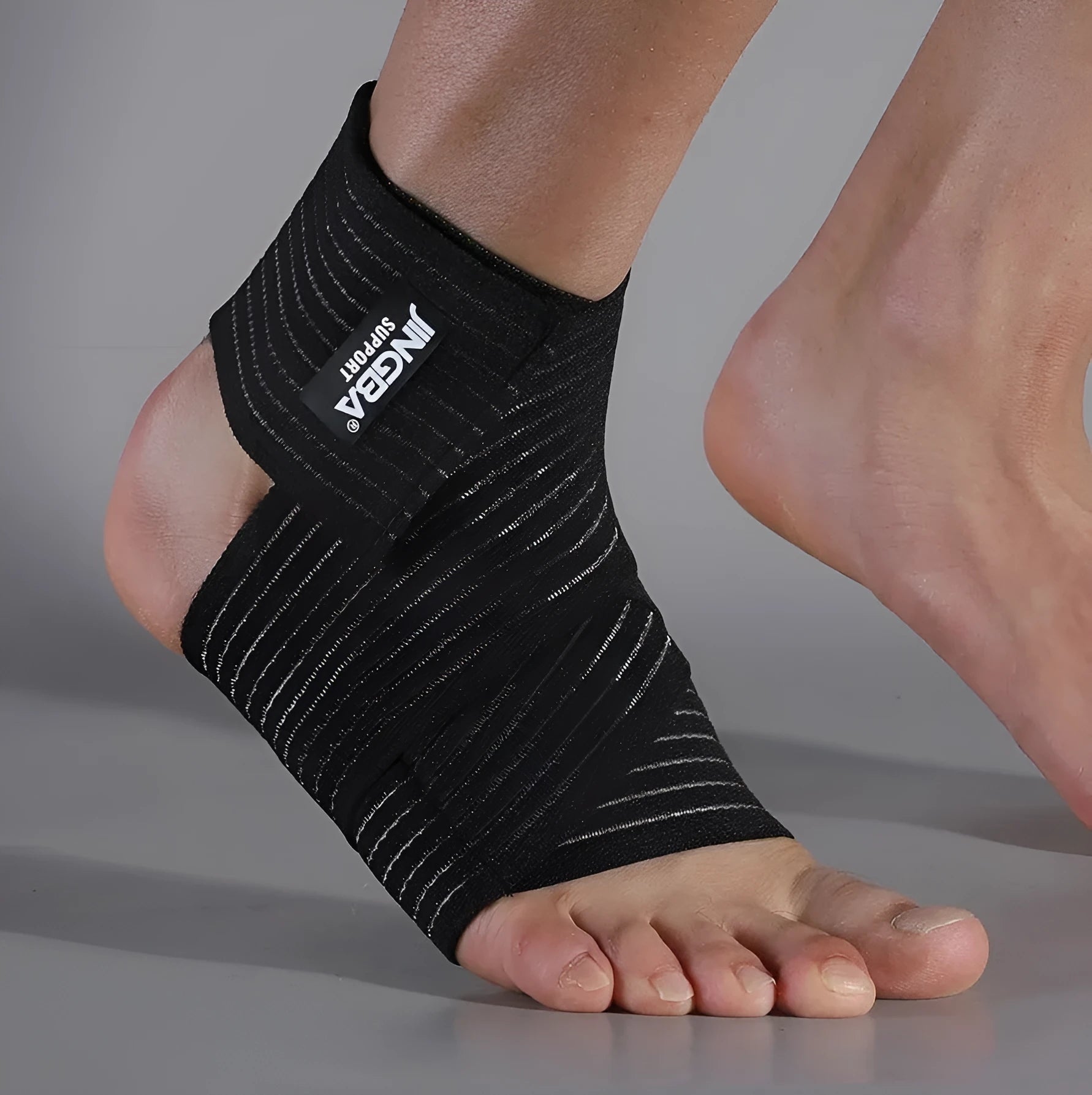Adjustable black sports ankle support bandage for running, basketball, and cycling