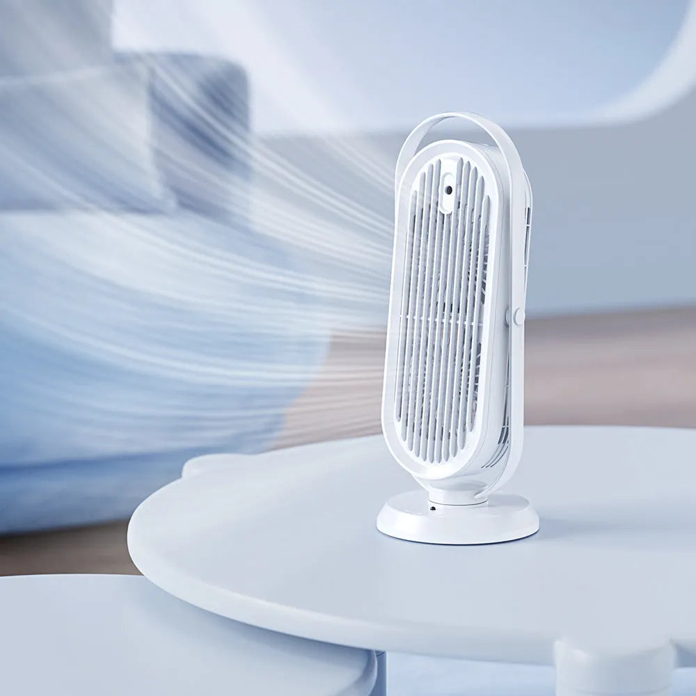 White modern desktop USB tower fan with remote control on a wooden desk, showing dual air outlets.