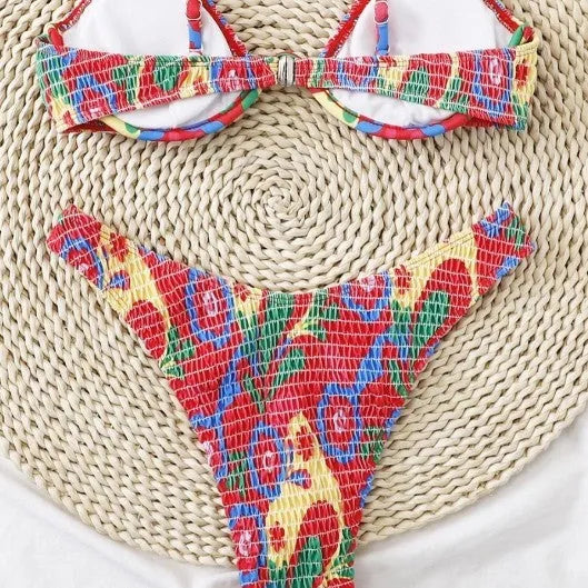 Red floral pattern women's underwire triangle bikini swimsuit with briefs, shown on a model.
