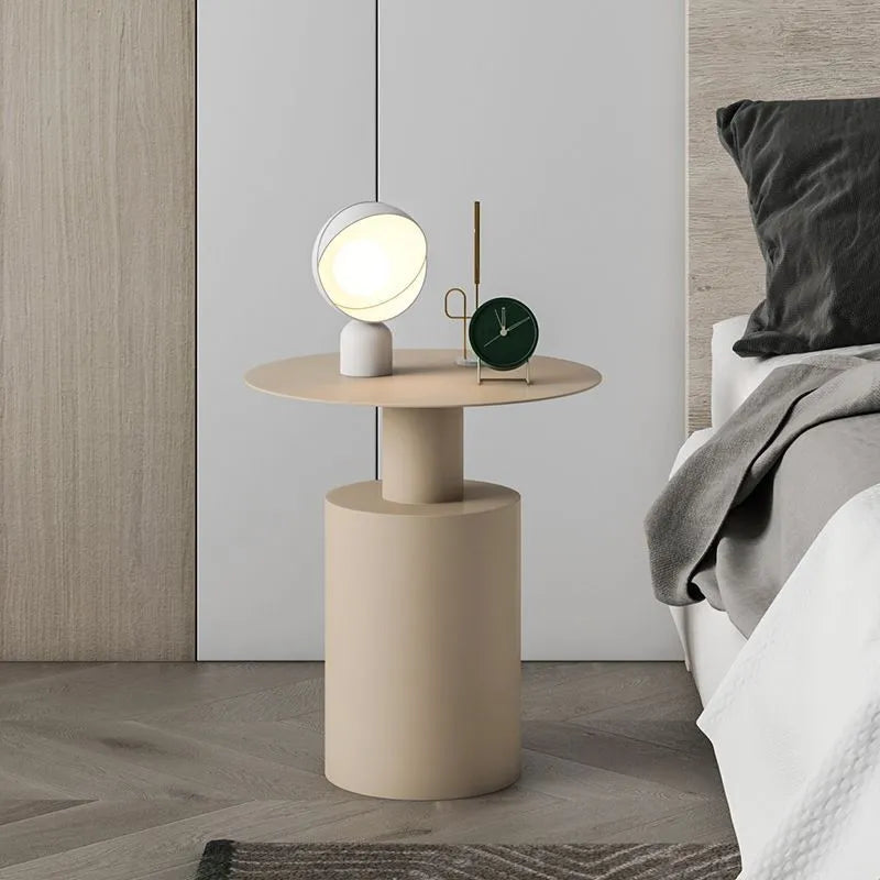 Round Nordic style metal bedside table in beige, frosted white, or frosted black for bedroom use