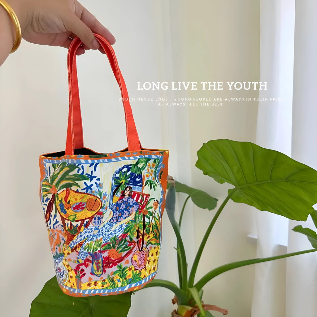 Dream garden orange plush bucket bag with printed letters and double shoulder straps