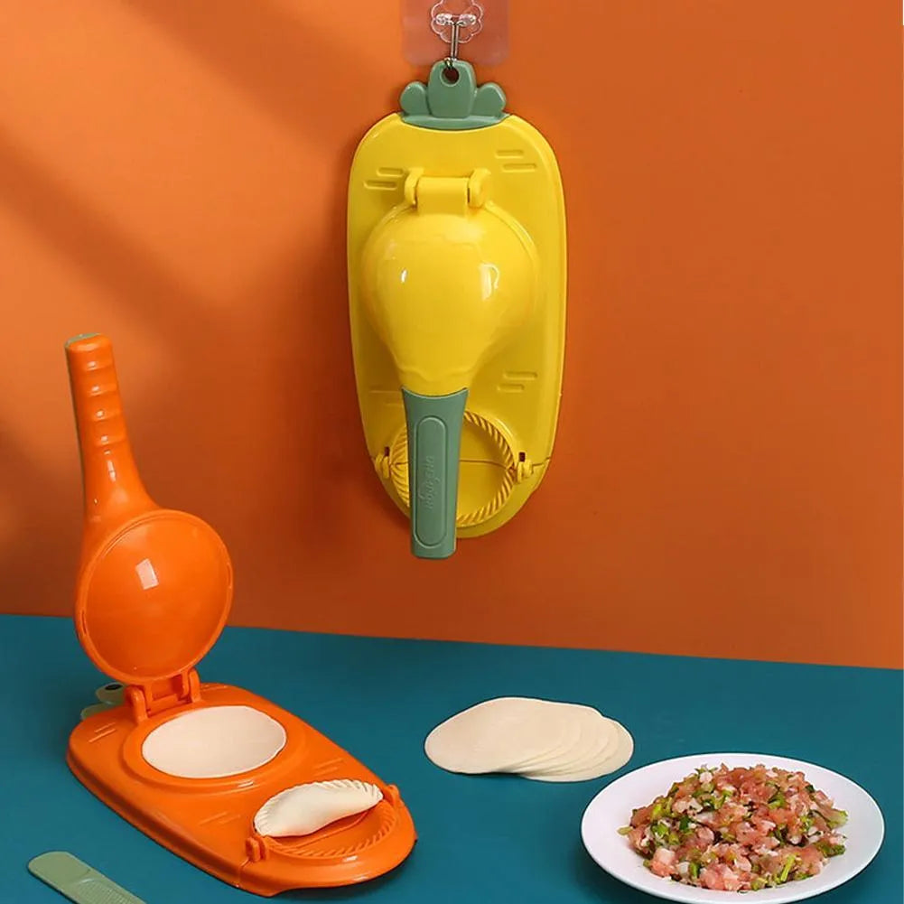 Orange and white plastic dumpling maker tool with ergonomic handle and hanging hole