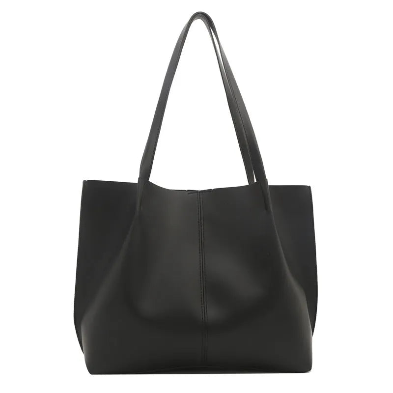 Black PU leather bucket messenger bag with stitching and open outer pocket, double straps, medium hardness