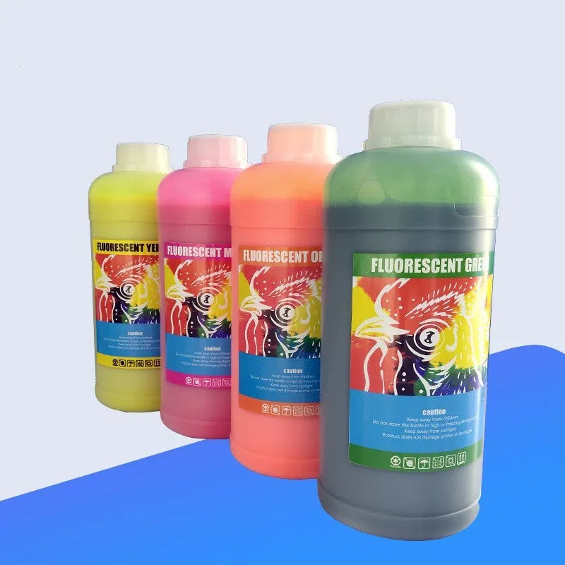 Fluorescent sublimation ink bottles for PET film printing in red, yellow, orange, and green colours